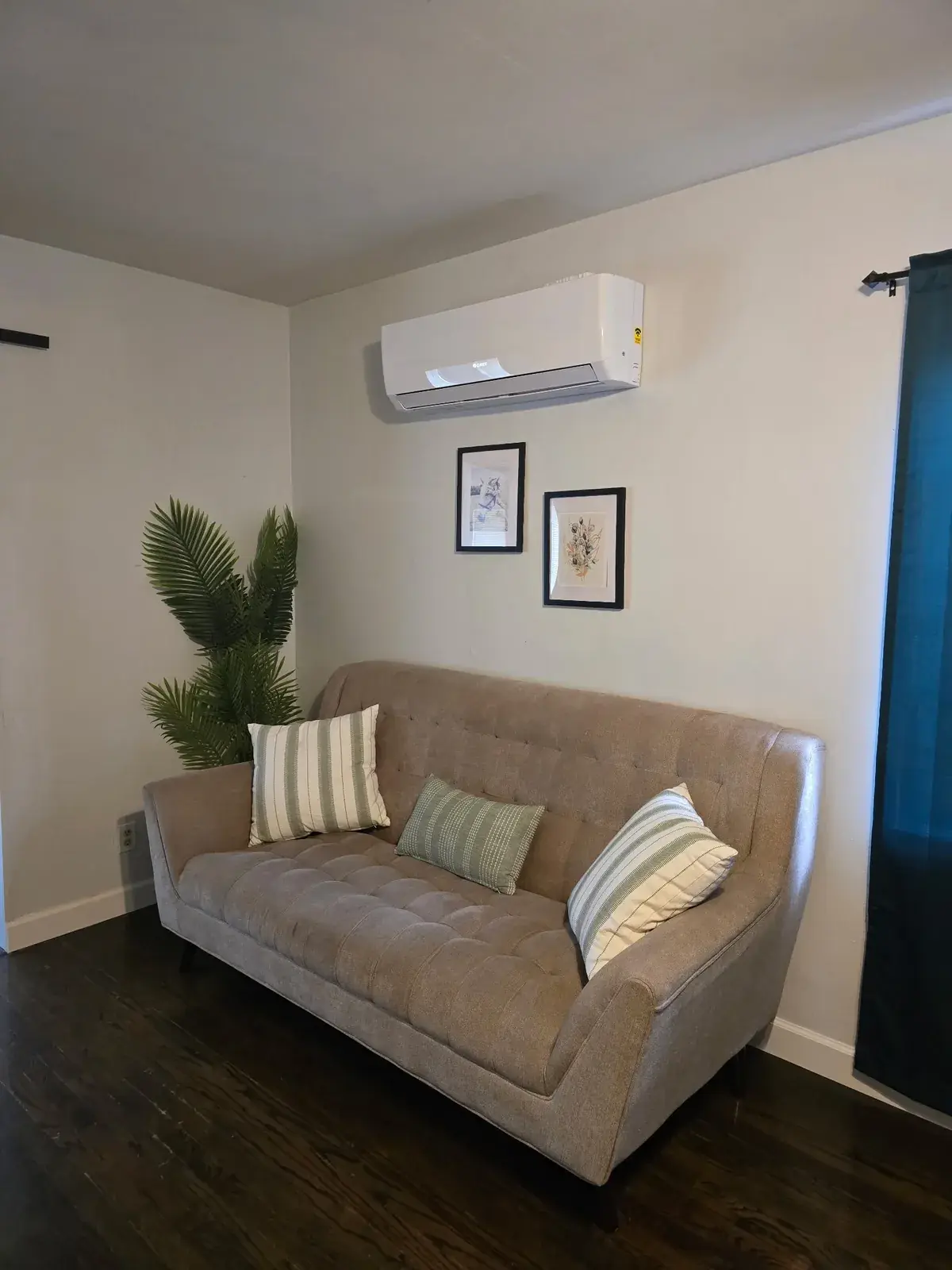 Wall-mounted mini split in a finished living room